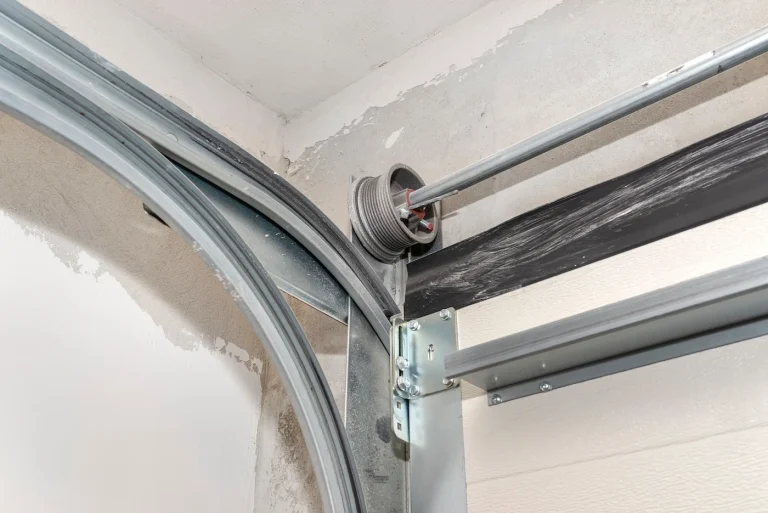 Garage door cable adjustment and balancing service in Garland TX for smooth and safe garage door movement.
