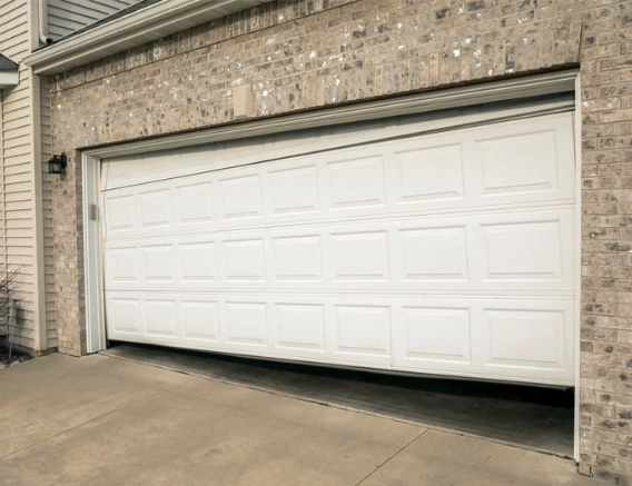 Modern overhead garage door installation service for residential property in Garland TX