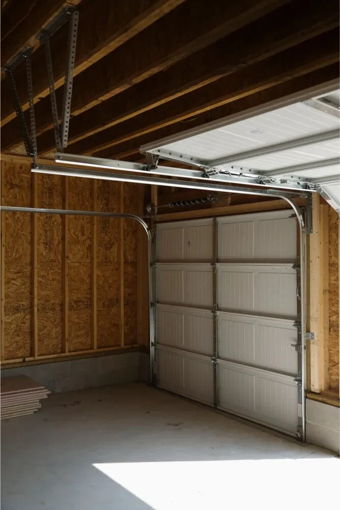 Off-track garage door repair and roller replacement services in Plano TX for smooth operation.