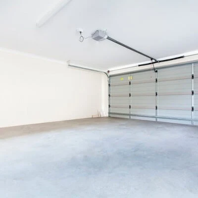 Garage door opener repair technicians fixing automatic garage systems in Rowlett TX.