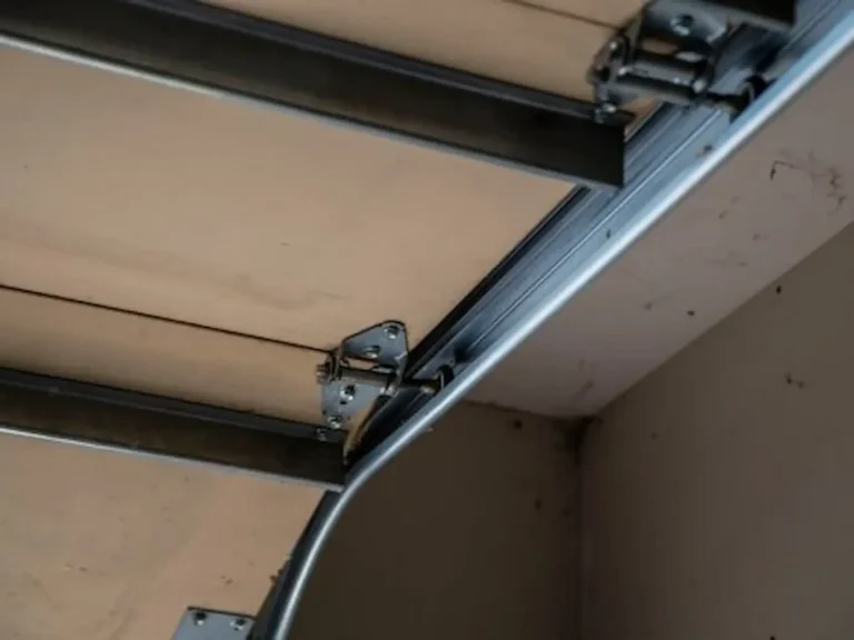Garage door off track repair service in Garland TX fixing stuck and misaligned garage door systems safely.
