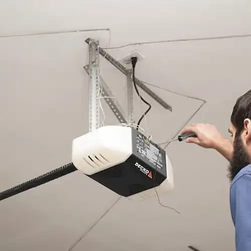 Garage door opener remote programming and smart system setup in Garland TX for residential garages