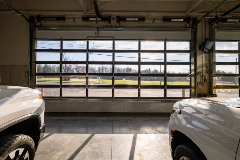 Expert garage door technician performing broken spring repair in Sachse TX