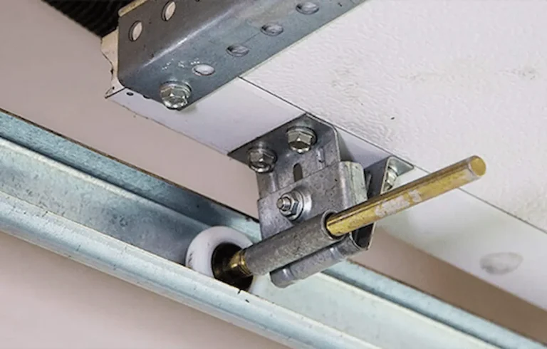Residential garage door roller replacement and track repair service in Garland TX for homeowners