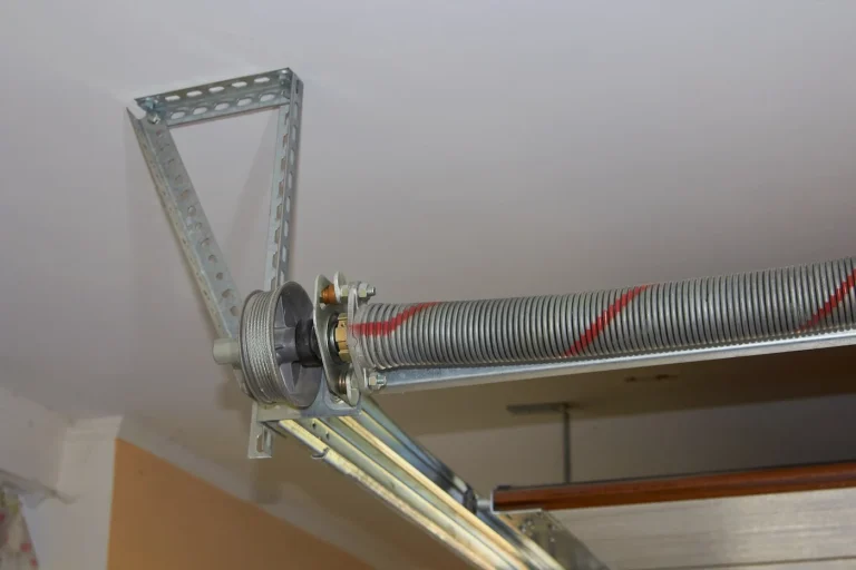 Emergency garage door cable repair in Garland TX for tilted, stuck, or unsafe garage doors with snapped cables.