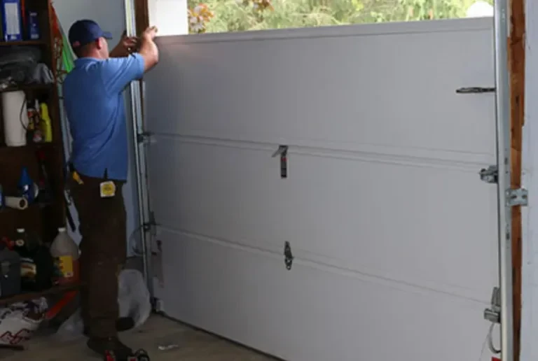 Garage door panel replacement service in Garland TX for broken, warped, and rusted garage door sections.