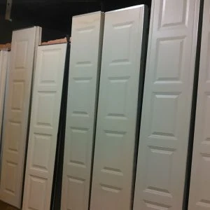 Garage door opener repair technicians fixing automatic garage systems in Richardson TX.
