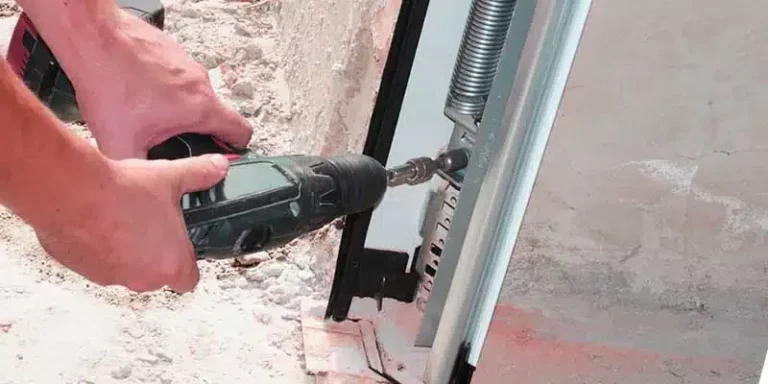 Local garage door company repairing broken garage door springs and openers in Rowlett Texas.